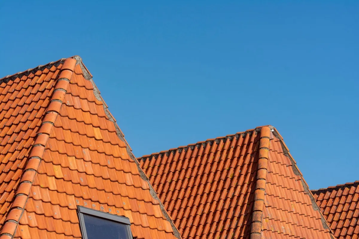 Clay barrel tile rooflines on homes in Greenwood, IN