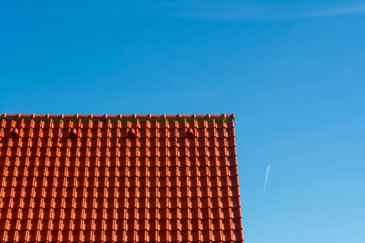 Tile roof gable in full sun, the kind of exposure that sets roof life in Greenwood, IN